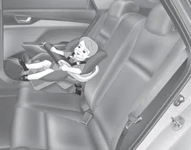 Hyundai Accent forward-facing child restraint with harness installed in rear seating position