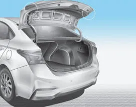 Hyundai Accent tail lamp and reverse lamp access behind trunk trim