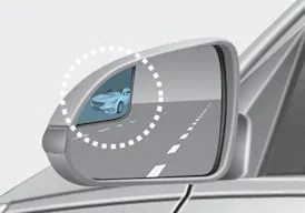 Hyundai Accent blind spot mirror (BSM) on driver-side mirror showing supplemental viewing area