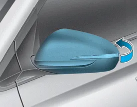Hyundai Accent manual folding side view mirror method by pushing the mirror housing rearward