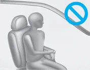 Hyundai Accent OCS warning: do not lean on the door or center console