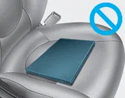 Hyundai Accent OCS warning: do not place electronic devices or conductive materials on the passenger seat