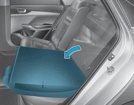 Hyundai Accent rear seatback partially folded forward during cargo expansion