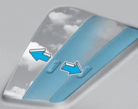 Hyundai Accent sunshade beneath the sunroof glass showing the sunshade open position