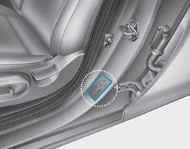 Hyundai Accent tire care label location and tire pressure specifications on driver-side center pillar