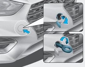 Hyundai Accent bumper towing hook cover removal point on the front or rear bumper